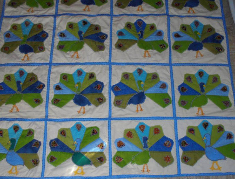 #960  Couch Throw - Blocks of Peacocks